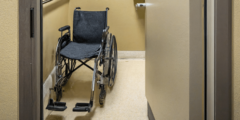 Accessible Wheelchair in a Toilet