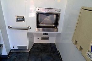Non compliant hand wash basin within Exeloo toilet